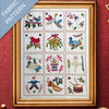 Framed fabric pattern with embroidered designs on a red background