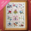Framed cross-stitched sampler with various designs on a red background