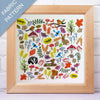 Framed fabric pattern with nature-themed designs on a white background