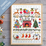Framed Christmas-themed fabric pattern with Santa's sleigh, reindeer, and fireplace on a wooden surface.