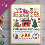 Framed Christmas-themed print with festive illustrations on a wooden surface.