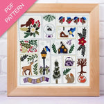 Framed cross-stitch pattern with various designs including birds, flowers, and animals on a white background.