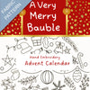 Hand embroidery advent calendar with Christmas-themed patterns and text.