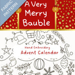 Hand embroidery advent calendar with Christmas-themed patterns and text.