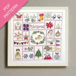 Framed cross-stitch pattern with Christmas-themed designs on a light gray background.