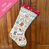 Decorative Christmas stocking with festive patterns on a wooden door, labeled 'PDF Pattern'.