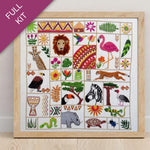 Embroidery kit with pre-designed pattern of animals and plants on a white fabric background.