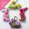 Colorful embroidered bunny patterns on a white background with 'PDF Pattern' text.