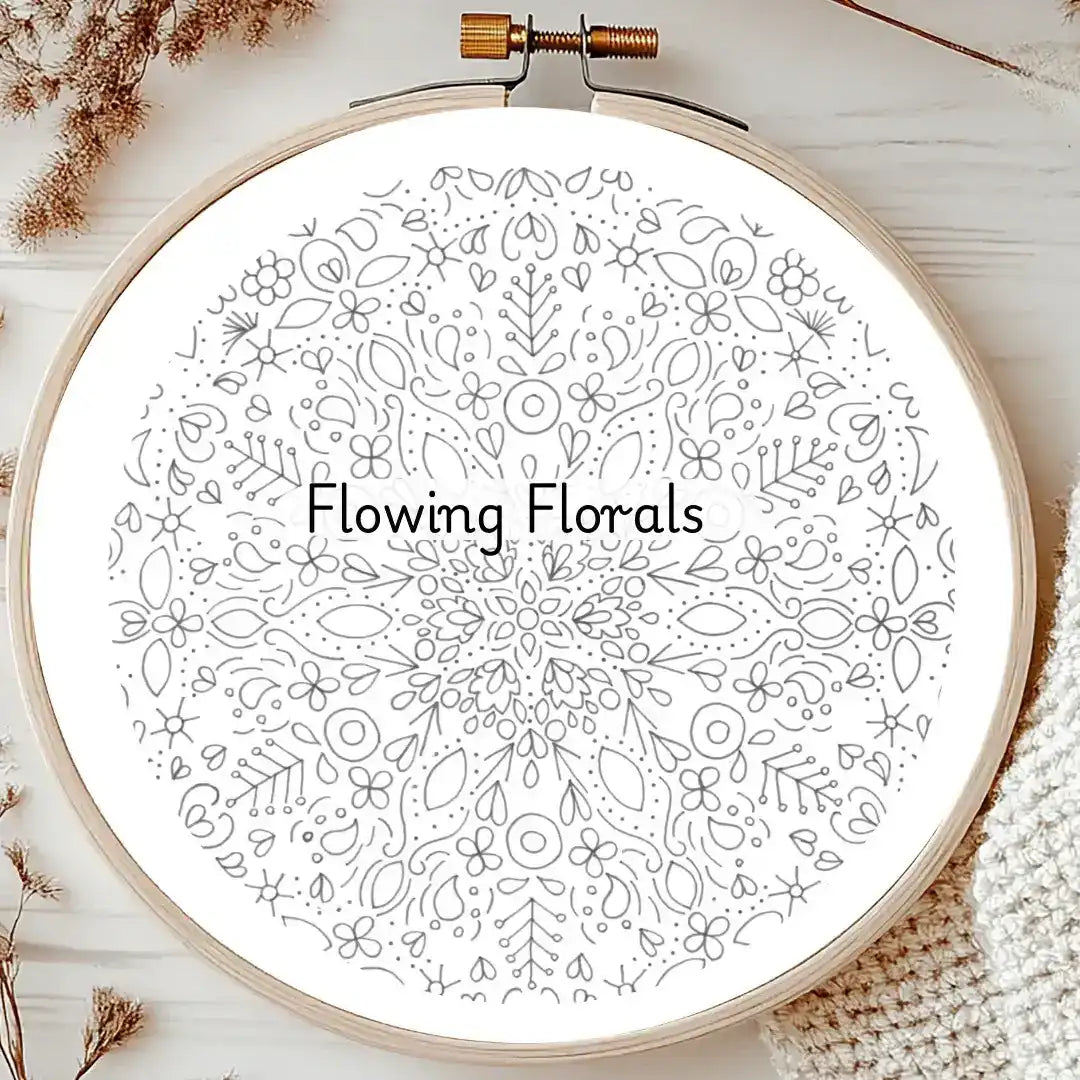 Embroidery hoop with 'Flowing Florals' pattern on a white background