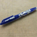 Pilot Frixion pen on a beige fabric background