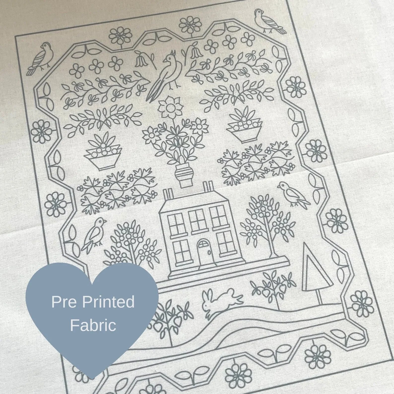 Pre-printed fabric with nature-themed design on a light background