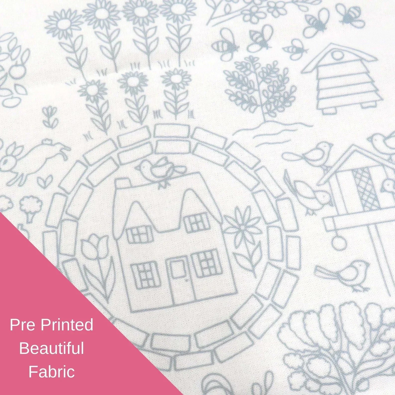 Pre-printed fabric with a garden scene including houses, birds, and flowers on a white background.