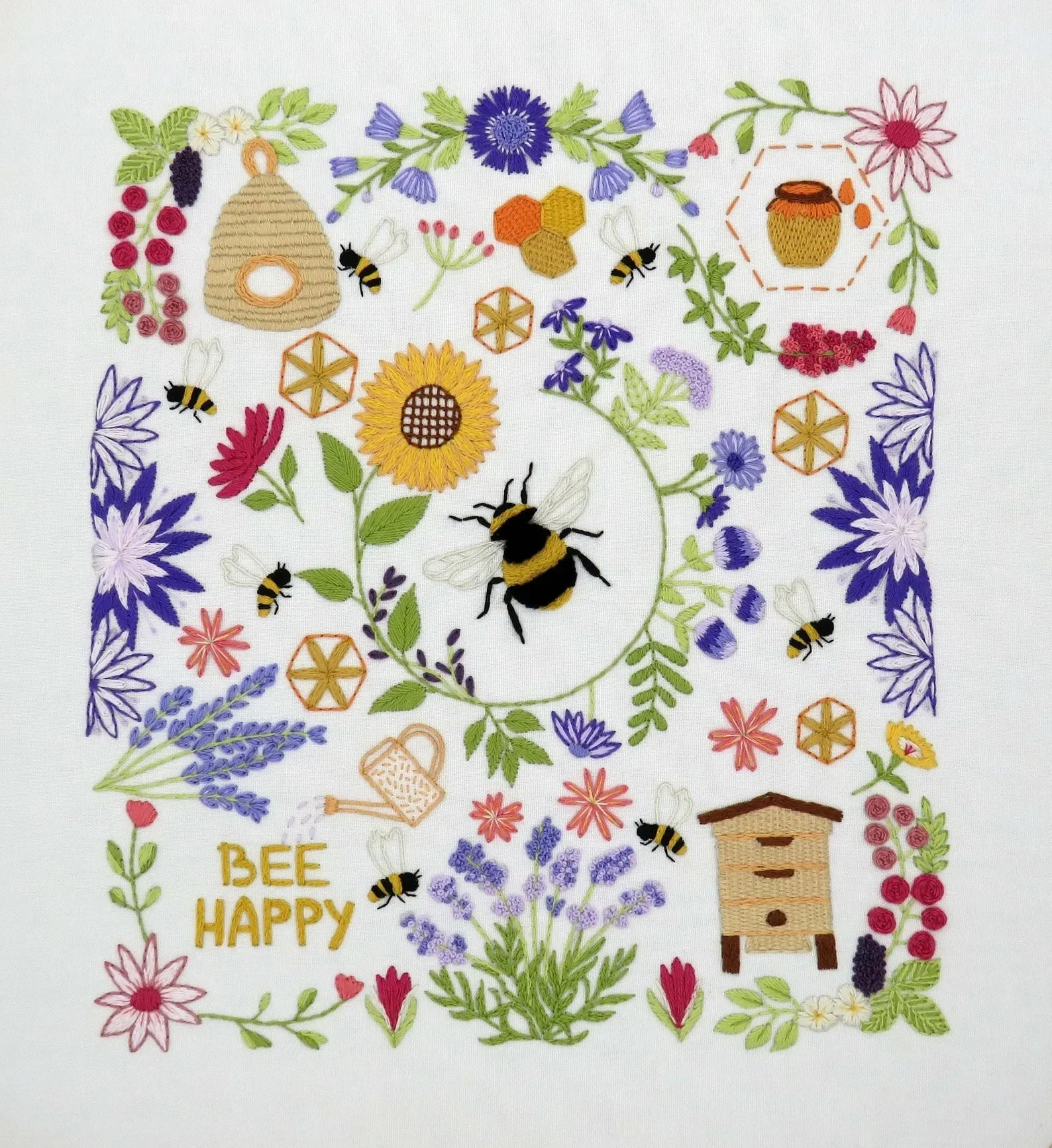 Decorative design with bees, flowers, and honeycomb elements on a white background.