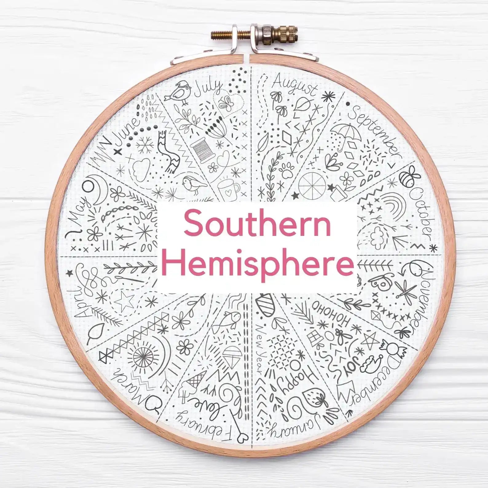 Embroidery hoop with a Southern Hemisphere calendar design on a white background