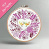 Embroidery hoop with floral and bird design on a white background, labeled 'PDF Pattern'.