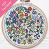 Embroidery hoop with floral pattern on a white background