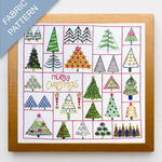 Fabric pattern with Christmas tree designs and 'Merry Christmas' text on a white background.
