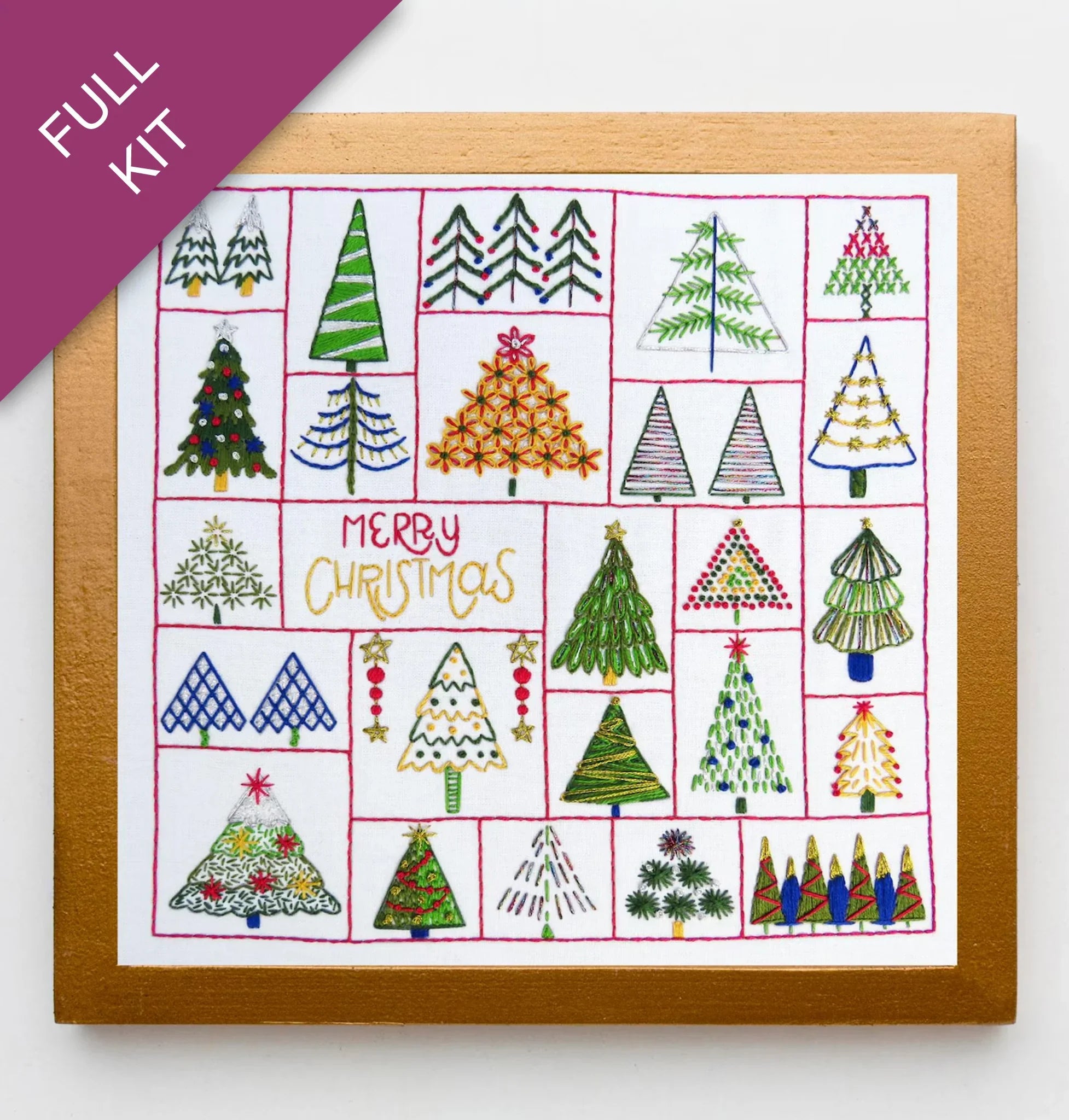 Embroidery kit with various Christmas tree designs on a white background