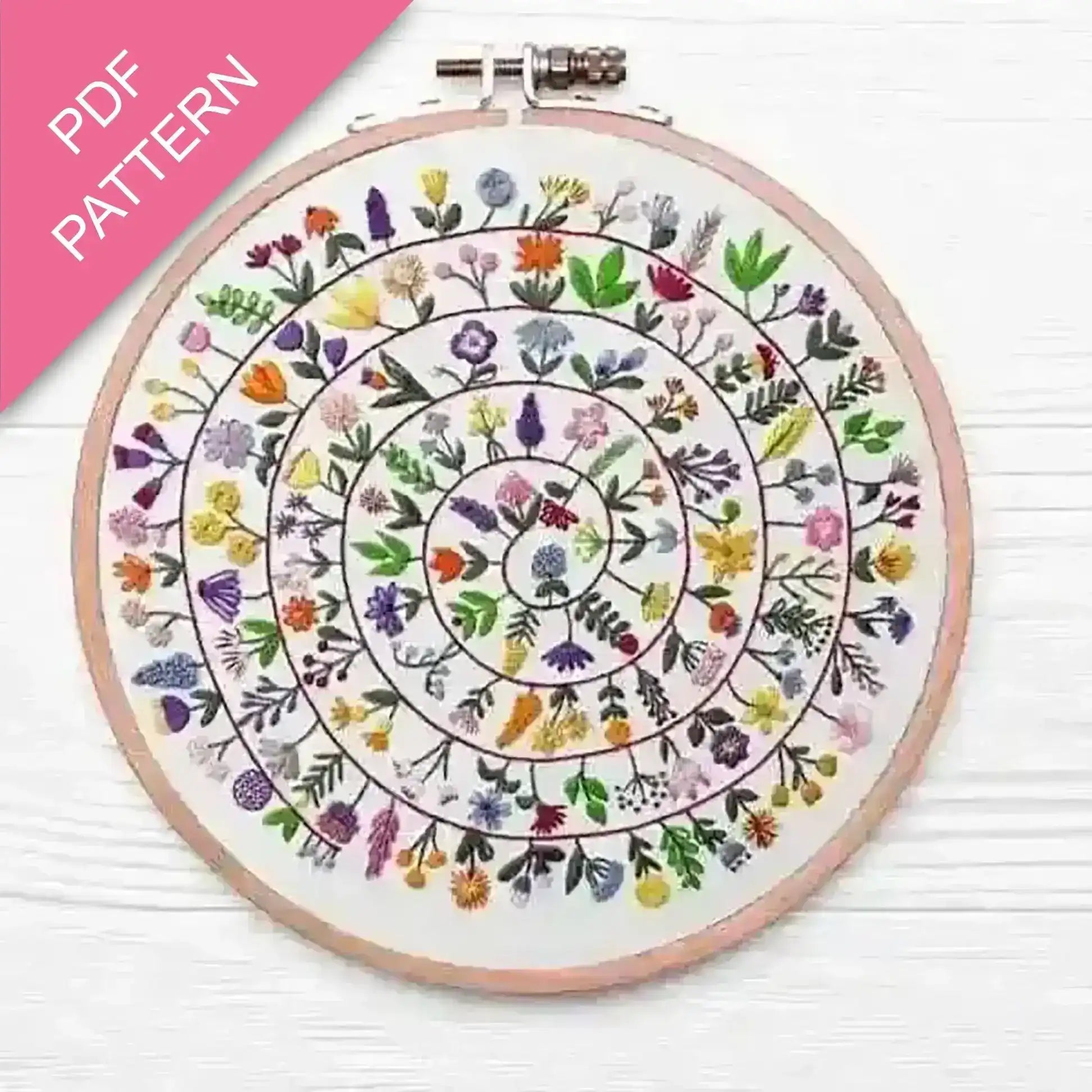 Embroidery hoop with floral pattern on a white background, labeled 'PDF Pattern'.