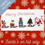 Fabric pattern with Christmas-themed design featuring Santa, reindeer, and snowflakes on a red background.