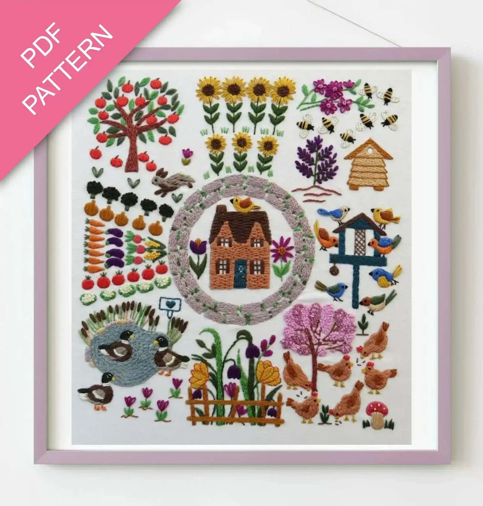 Embroidery pattern with a house, garden elements, and animals on a white background.