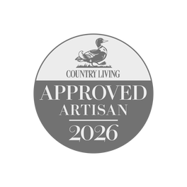 Badge for Country Living Approved Artisan 2026 with a duck illustration on a white background