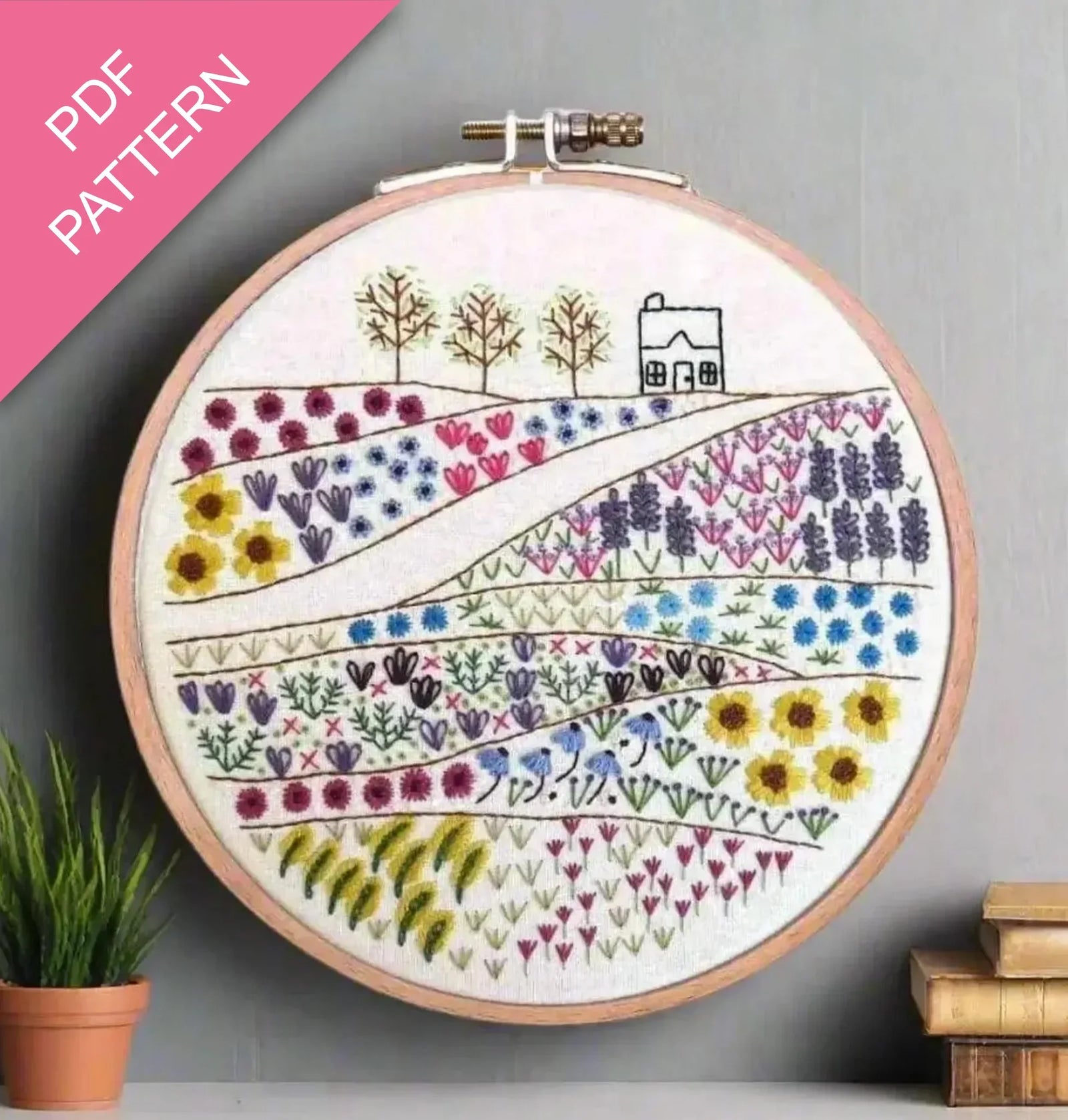 Embroidery hoop with floral design on a gray background, featuring 'PDF Pattern' text.