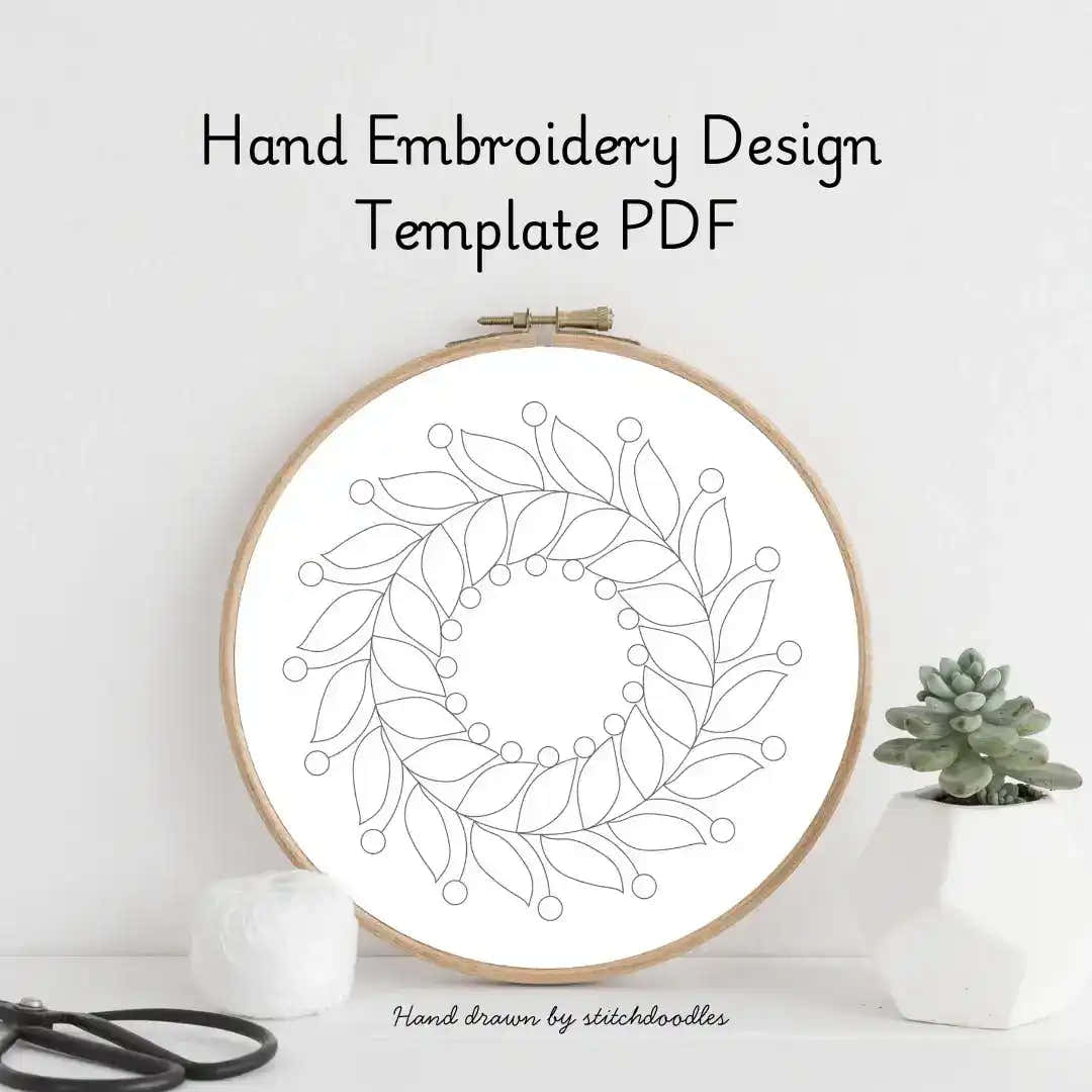 Hand embroidery design template PDF with a floral pattern in an embroidery hoop on a white background.