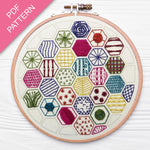 Embroidery hoop with colorful geometric patterns on a white background, labeled 'PDF Pattern'.