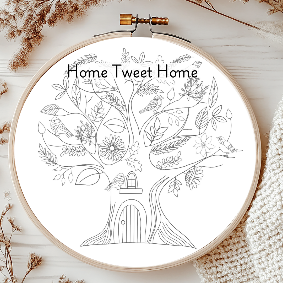 Embroidery hoop with 'Home Tweet Home' design on a white background
