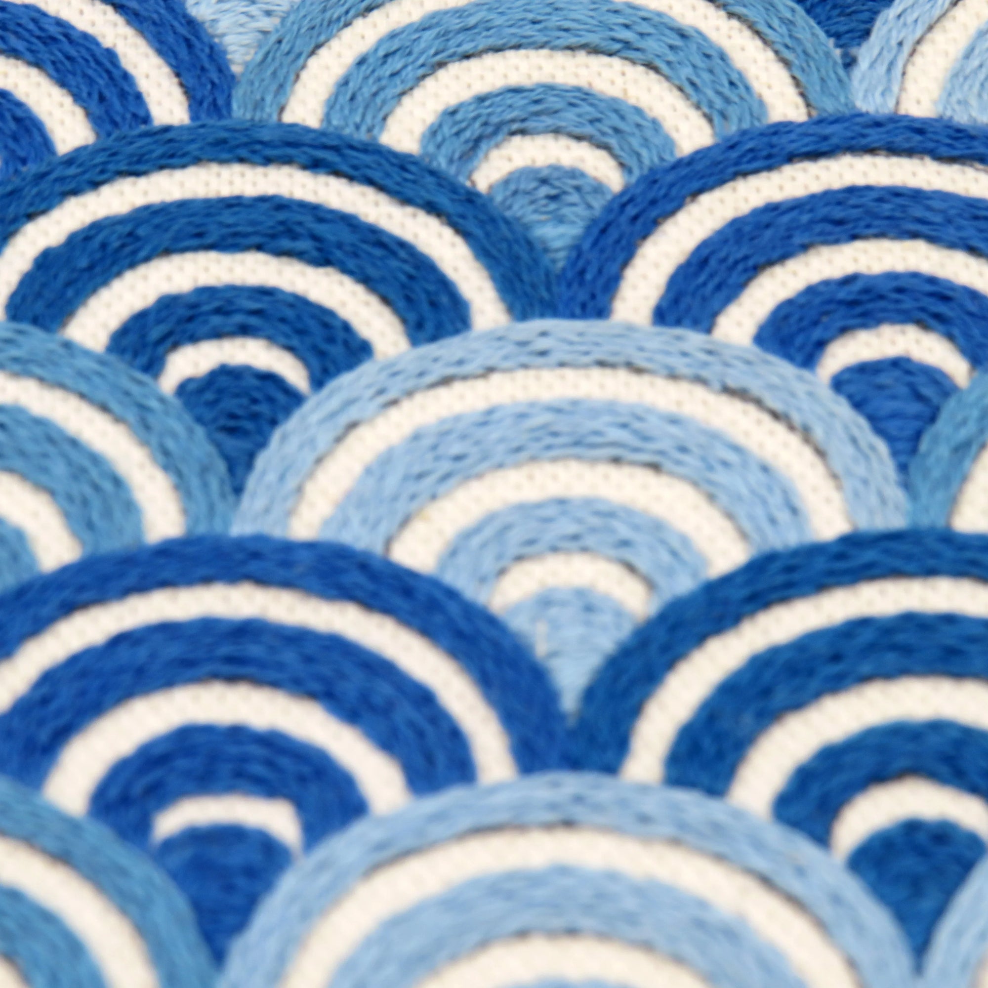 Close-up of blue and white circular patterned fabric