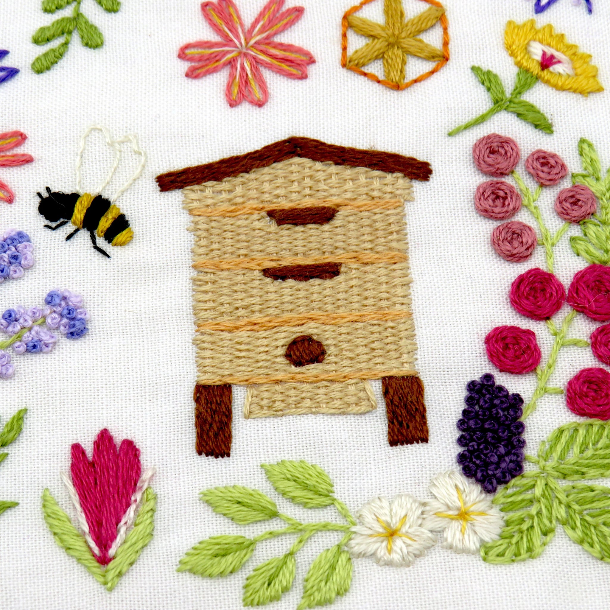 This listing is for a Pre Printed Fabric Panel - the design is printed for you on to a 100% beautiful Ivory Cotton fabric ready for you to get stitching straight away. This will be posted to you.

Bees and Blossoms is designed to be a calm and relaxing pattern to stitch with beautiful flowers and bees all surrounding the fabulous central bee that is wrapped inside a pretty sunflower.