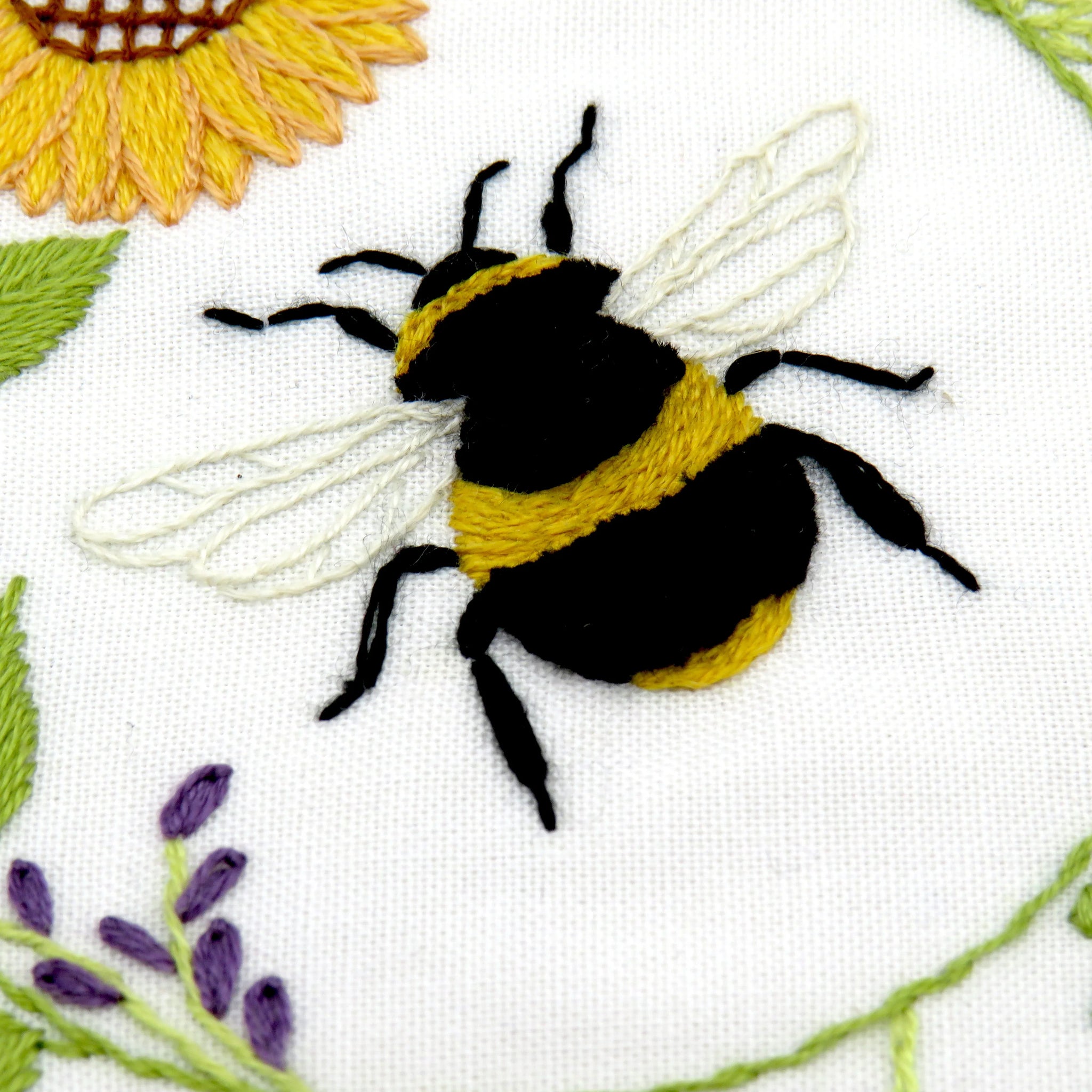 This listing is for a Pre Printed Fabric Panel - the design is printed for you on to a 100% beautiful Ivory Cotton fabric ready for you to get stitching straight away. This will be posted to you.

Bees and Blossoms is designed to be a calm and relaxing pattern to stitch with beautiful flowers and bees all surrounding the fabulous central bee that is wrapped inside a pretty sunflower.