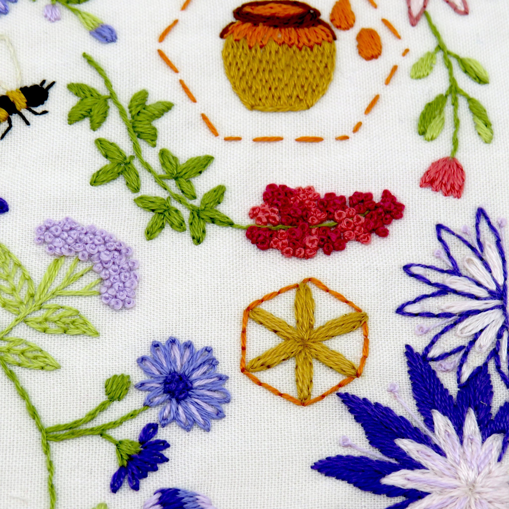 This listing is for a Pre Printed Fabric Panel - the design is printed for you on to a 100% beautiful Ivory Cotton fabric ready for you to get stitching straight away. This will be posted to you.

Bees and Blossoms is designed to be a calm and relaxing pattern to stitch with beautiful flowers and bees all surrounding the fabulous central bee that is wrapped inside a pretty sunflower.