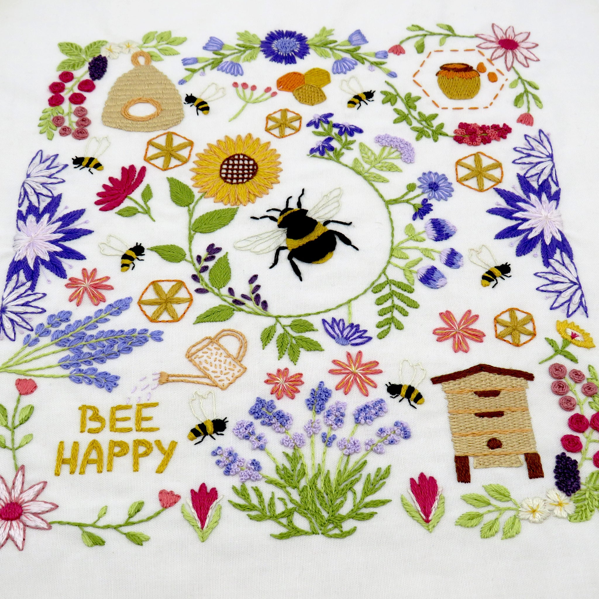 This listing is for a Pre Printed Fabric Panel - the design is printed for you on to a 100% beautiful Ivory Cotton fabric ready for you to get stitching straight away. This will be posted to you.

Bees and Blossoms is designed to be a calm and relaxing pattern to stitch with beautiful flowers and bees all surrounding the fabulous central bee that is wrapped inside a pretty sunflower.