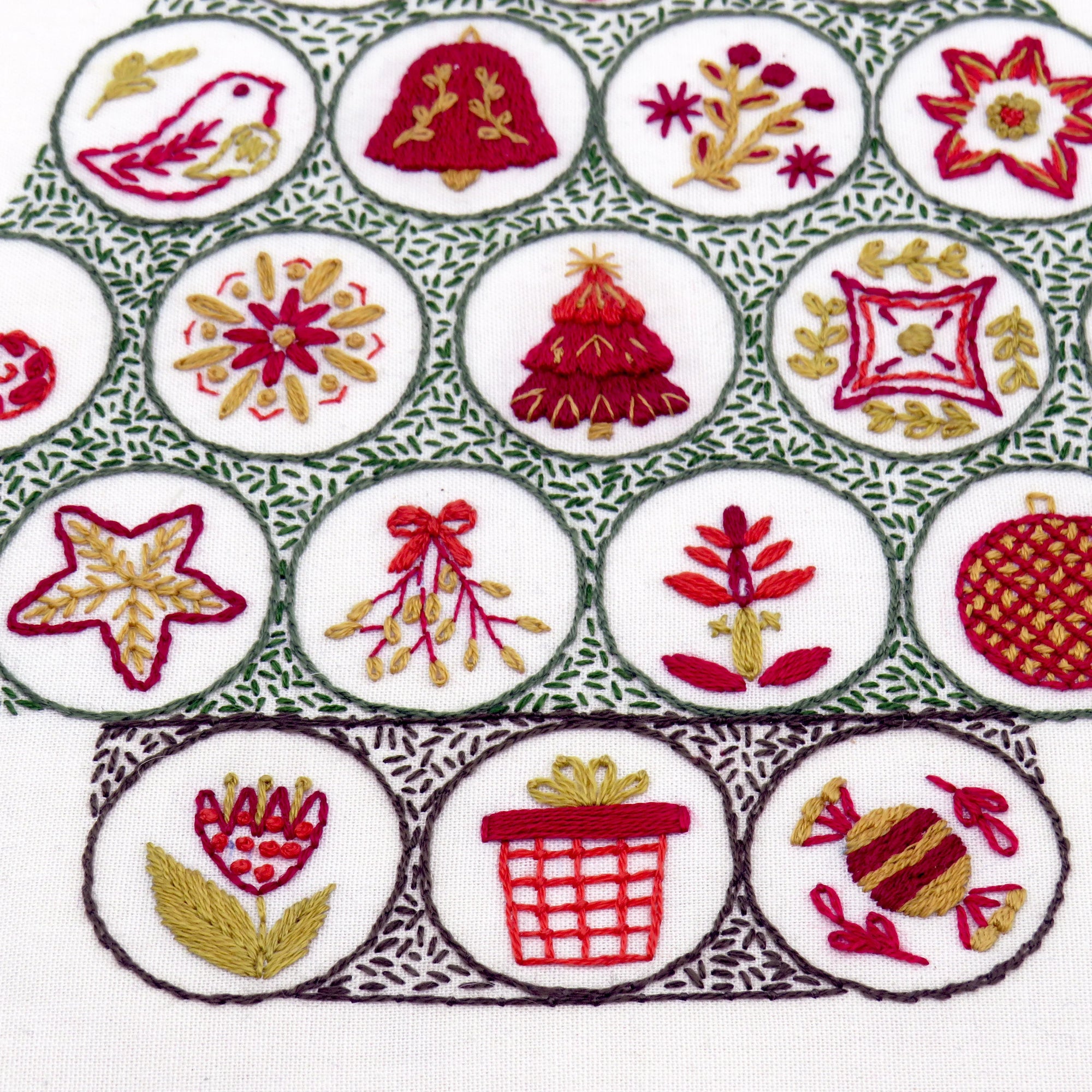This is the fantastic Advent Calendar design we stitched for Christmas 2022 and it is now available as a full pattern so everyone can stitch a beauitful tree filled with folk decorations.

This design is suitable for beginners as well as the more advanced stitcher to create a fun stitched piece to make your home look special during the Christmas period.