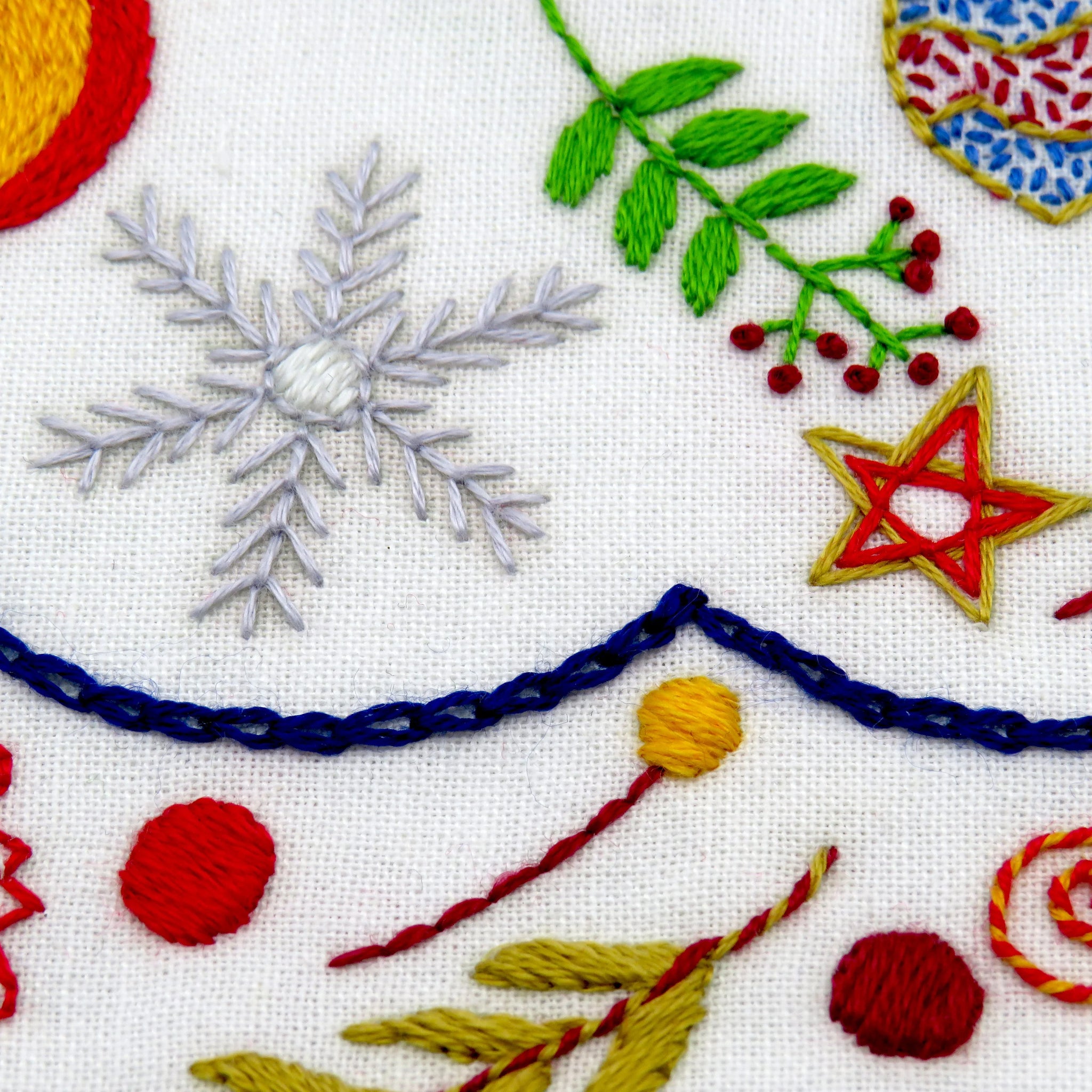 Delight in creating your own beautiful Christmas embroidery pattern in December. Stitch one festive element every day of Advent and experience the joy of counting down to Christmas. Let your creativity shine as you work with fabric, colorful threads, and a variety of lovely stitches!