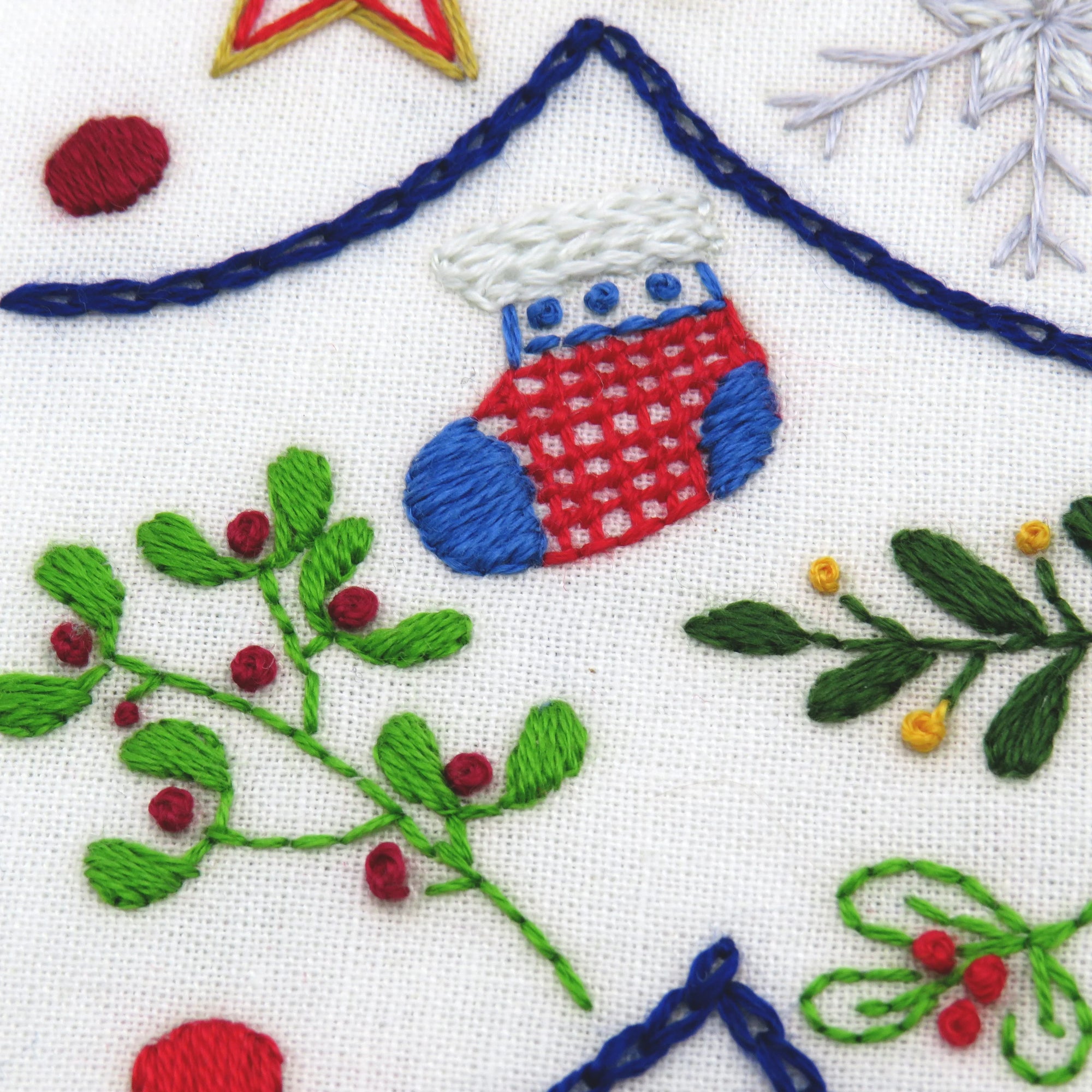 Delight in creating your own beautiful Christmas embroidery pattern in December. Stitch one festive element every day of Advent and experience the joy of counting down to Christmas. Let your creativity shine as you work with fabric, colorful threads, and a variety of lovely stitches!