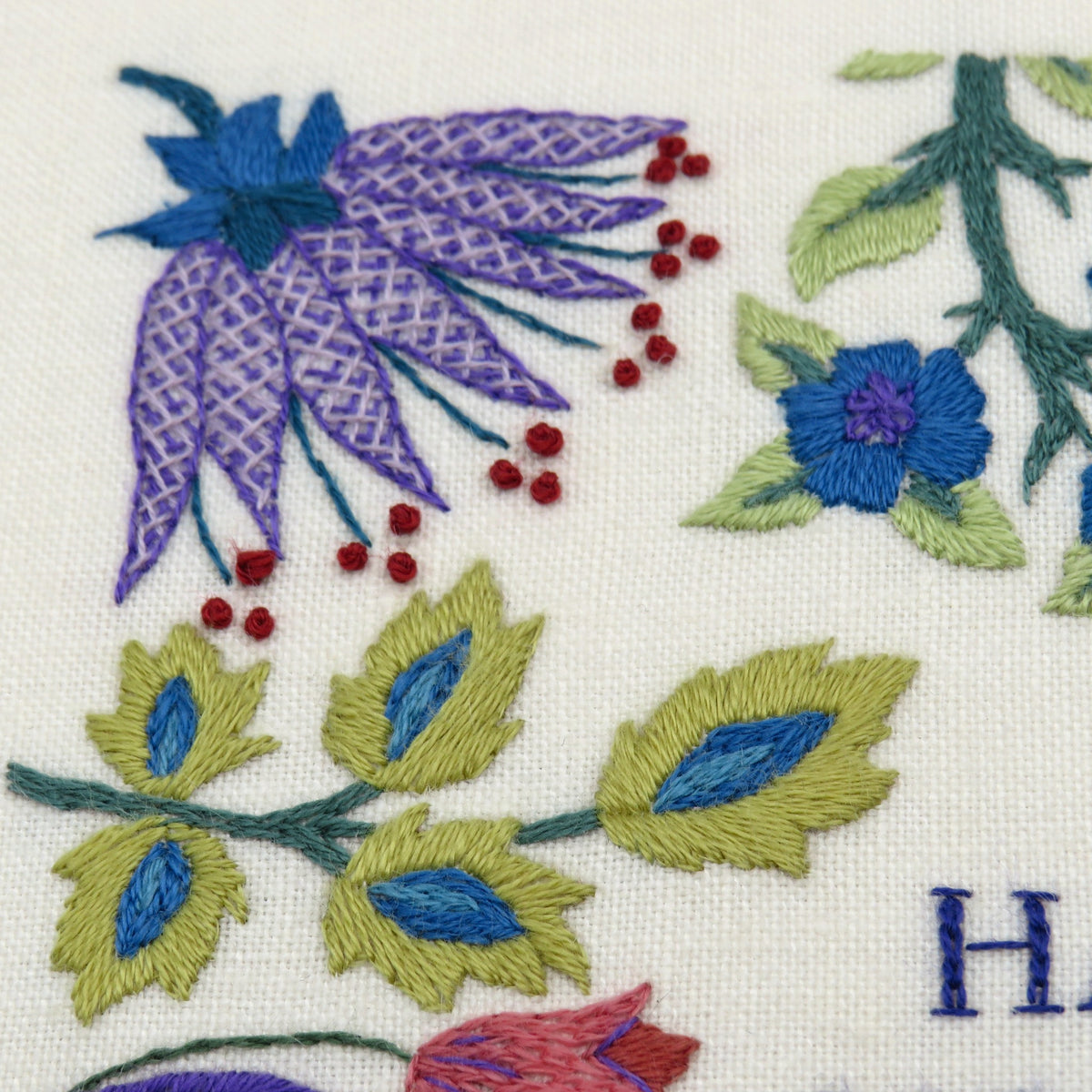 This famous quote by William Morris is beautifully stitched surrounded by a selection of Morris' own wonderful floral elements.&nbsp;