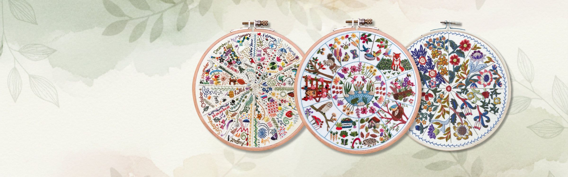 Stitchdoodles modern hand embroidery. Three embroidery hoops with colorful floral patterns on a light background