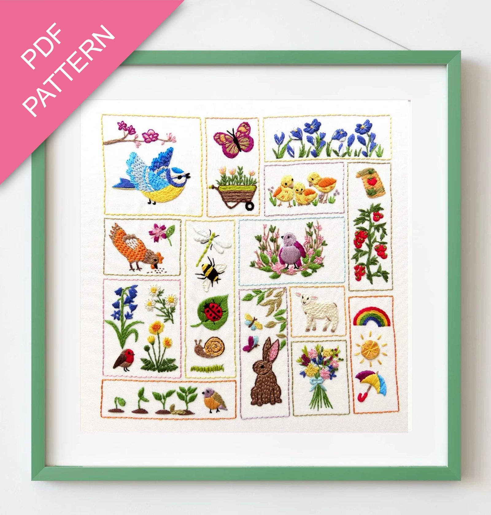 Embroidery pattern with various designs including animals, plants, and nature-themed elements framed with a green border.