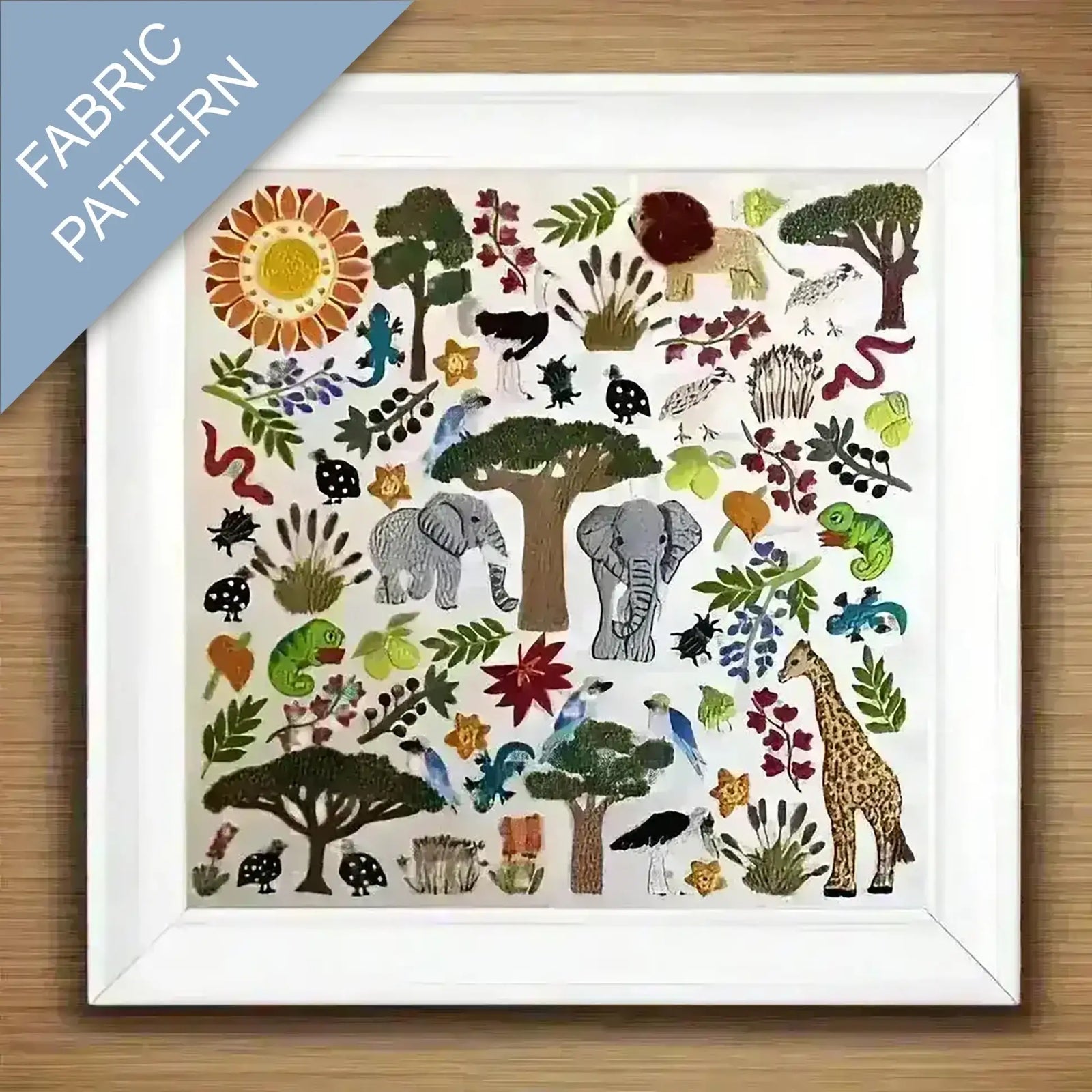 Fabric pattern with animals, trees, and plants on a wooden surface