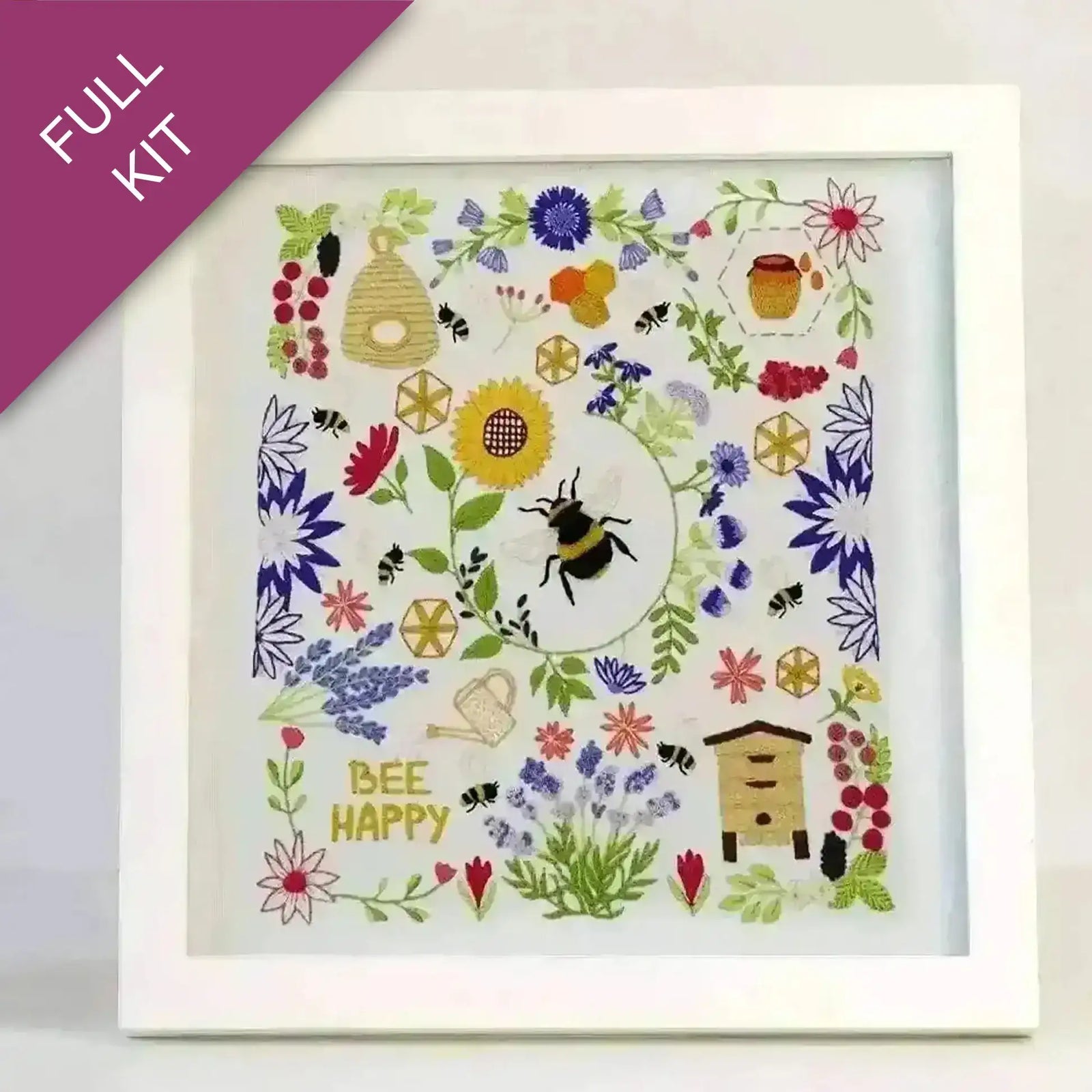 Embroidery kit with bee and floral design on a white background