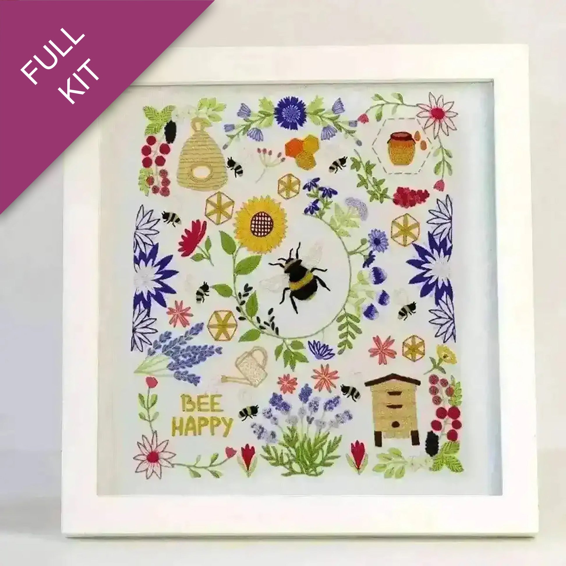 Embroidery kit with bee and floral design on a white background