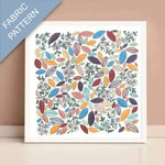 Colorful leaf pattern on fabric with 'Fabric Pattern' text.