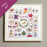 Embroidery kit with Christmas-themed designs on a white background