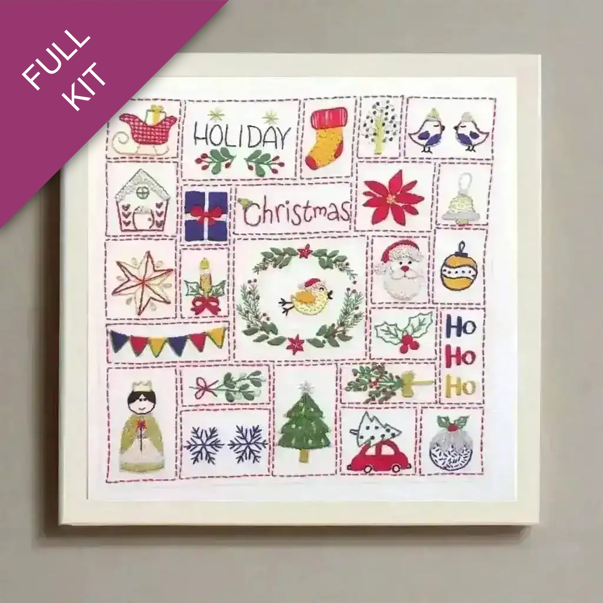 Embroidery kit with Christmas-themed designs on a white background