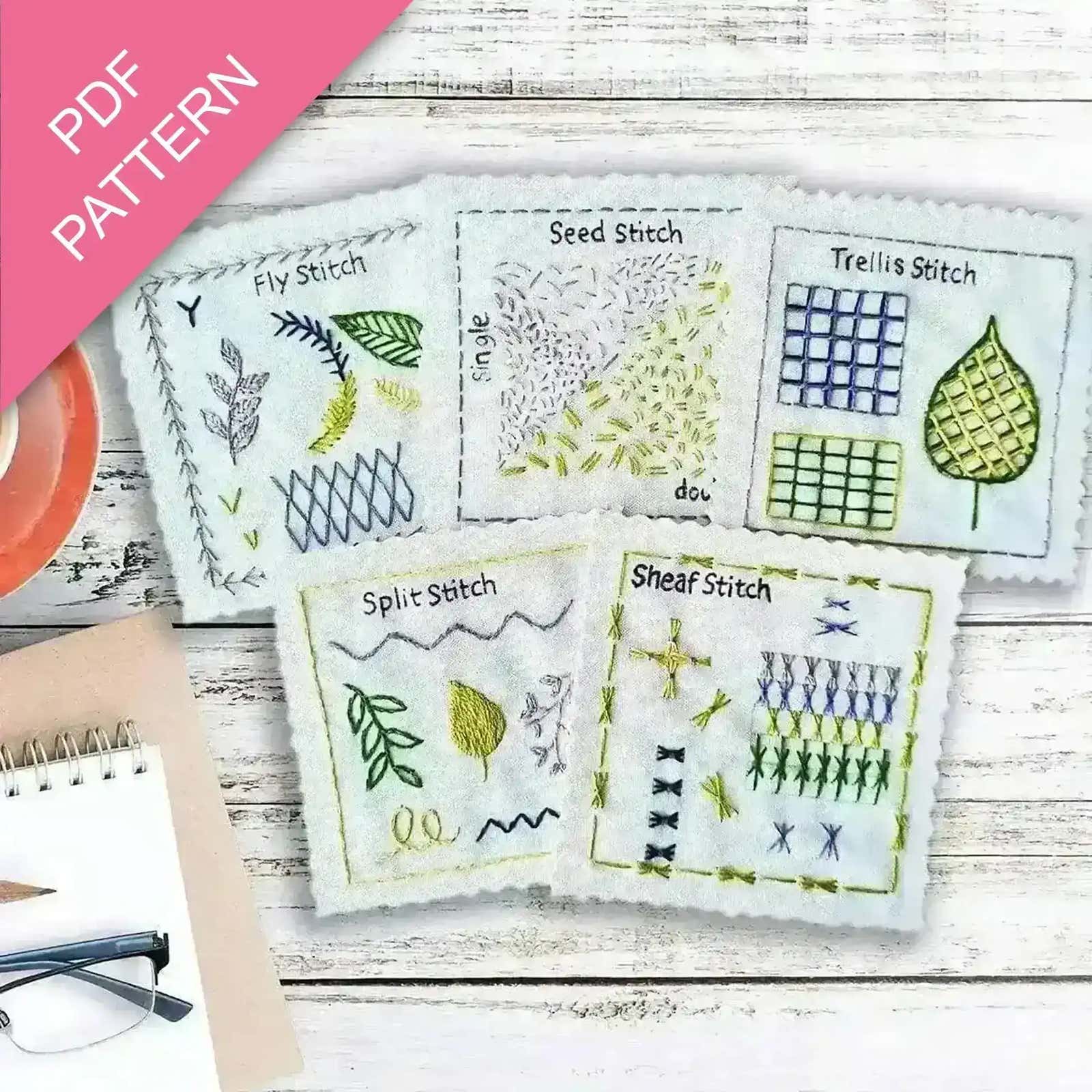 Embroidery pattern with various stitches on a wooden surface, featuring a PDF pattern label.