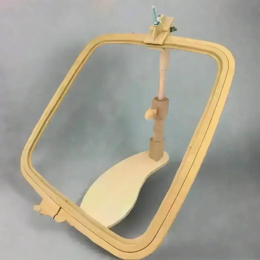 Wooden embroidery hoop on a gray background