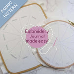 Embroidery hoop and fabric pattern with 'Embroidery Journal made easy' text.